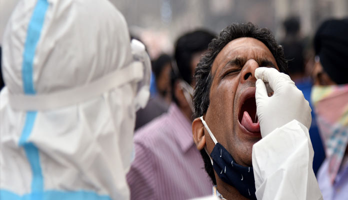Covid positive cases surge past 900-mark in Karnataka